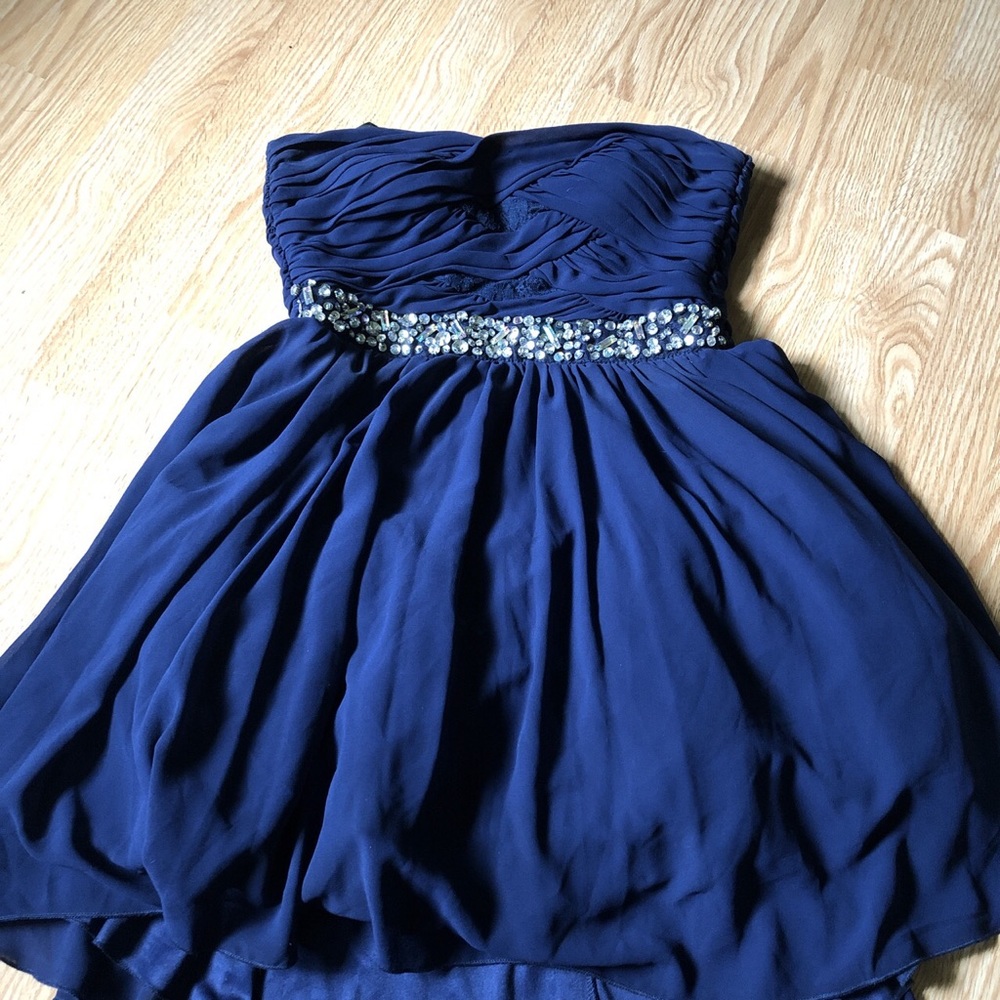 Blue strapless ruffled mini dress